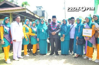 Buka Jambore PKK di Reteh, Bupati Inhil Kukuhkan Bapak dan Bunda Asuh Anak Stunting