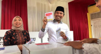 Ketua DPRD Jambi Apresiasi Antusiasme Warga di TPS Meski Diguyur Hujan