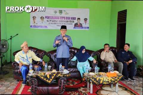 Bupati HM Wardan Serahkan NIPD dan NIKD  Kecamatan Teluk Belengkong