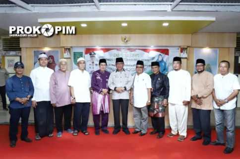 Bupati Wardan Serahkan NIKD dan NIPD Kades dan Perangkat Desa di Tempuling