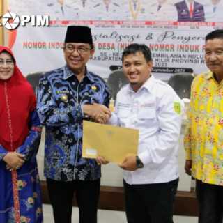 Bupati Wardan Serahkan NIKD Dan NIPD Pada 4 Desa se-Kecamatan Tembilahan Hulu