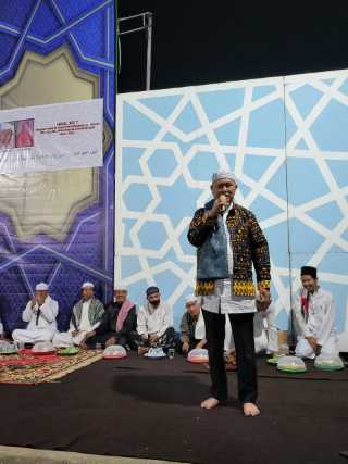 Hadiri Haul Ke-7 Almrh H.Sindring di Ponpes Modern Al-Azkiyah Pengalihan, Wabup SU Serahkan Al-Qur’an dan Kipas Angin