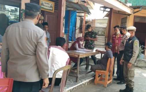 Satpol PP Reteh Lakukan Pengawasan dan Pengamanan Kegiatan Vaksinasi